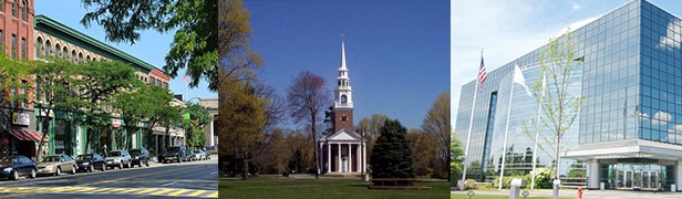 picture of the front of a traditional brick church with white steeple and the grass in front 